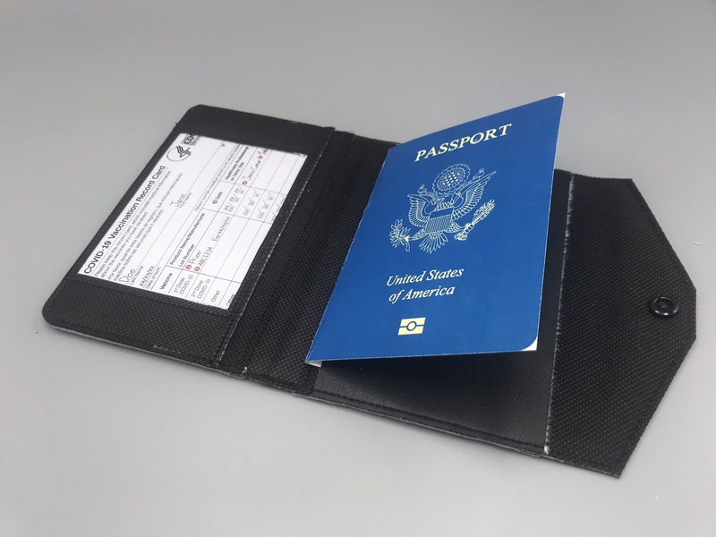 Vax card window in a passport cover