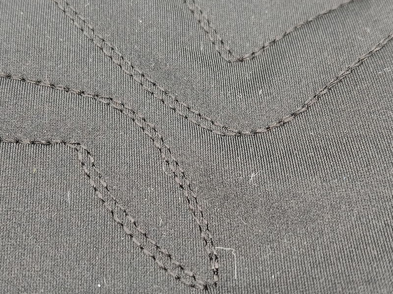 Moth leg stitching, with the two runs out of alignment