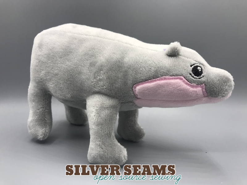 A small plush baby pygmy hippo