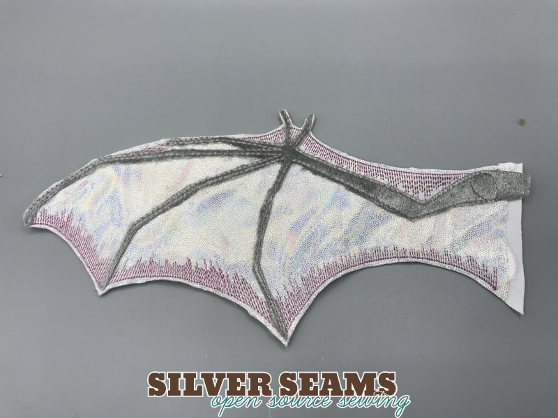 The trial Shield Dragon wing, stitched out and with one goof.