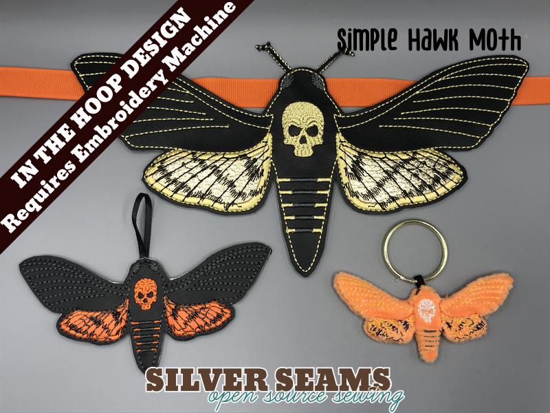 Three death's-head hawk moths, two in vinyl and one in plush.