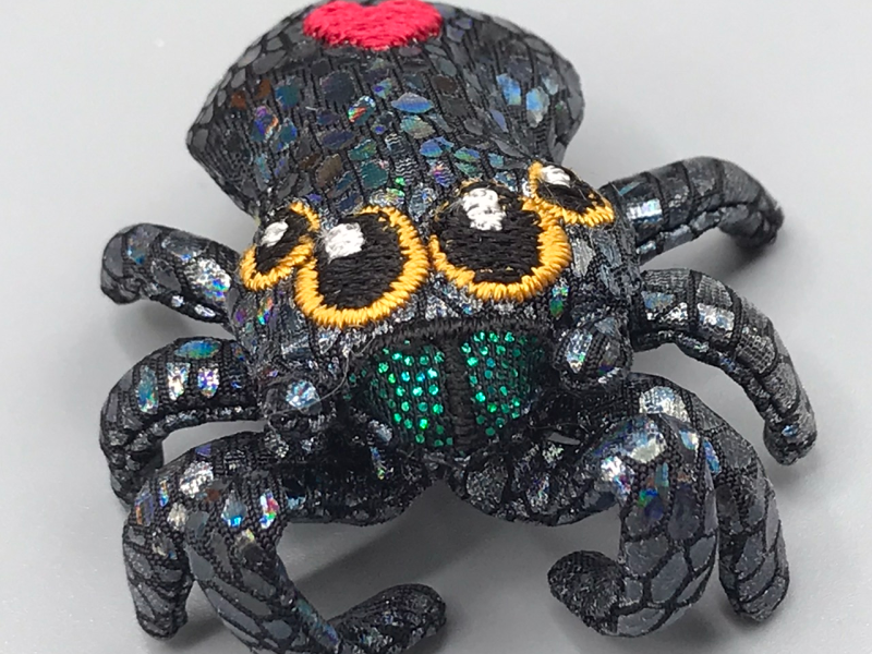 Spider closeup. The eye embroidery is a little ragged.