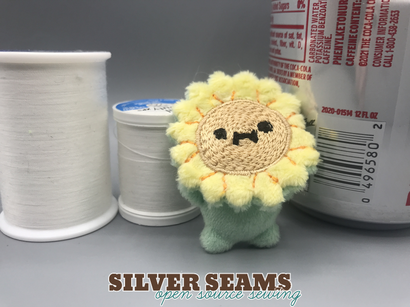 A two-inch tall kawaii sunflower person.