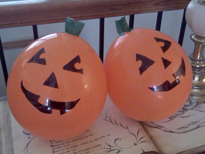 Two pumpkin balloons