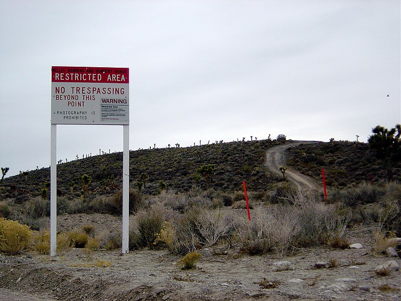 Area 51 warning sign. By Made by X51 (Flickr: https://www.flickr.com/photos/x51/ Web: http://x51.org/), CC BY-SA 3.0, https://commons.wikimedia.org/w/index.php?curid=245266
