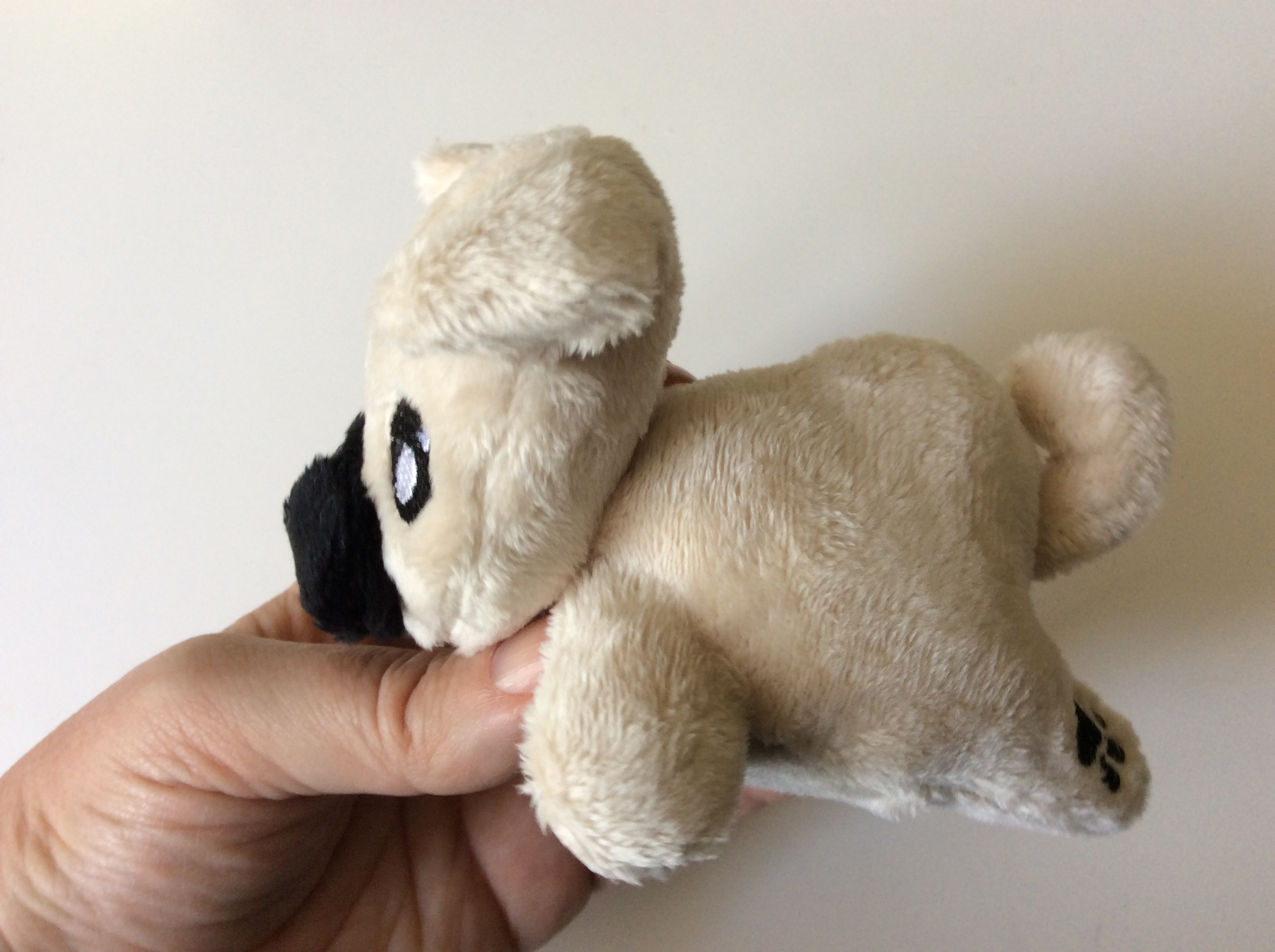 Plush pug side view